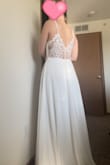 This dress is comfy and simple and the price point gave me room to get the alterations that I wanted to really make it mine. The back is easily the best part of the dress. After adding a leg slit, cute pearl double straps, and a sparkly belt it's perfect and cost me less than $400. :) - Cary S.
