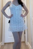 LOVE LOVE LOVE!! I am absolutely blown away by this dress. It fits perfectly, is flattering on my body, and is SO adorable. I am going to wear it for my graduation in June and I cannot wait!! The flowers embroidered are stunning. The dress is not see-through, but the tan slip that is underneath gives it a sexy look. It is so comfortable and a very high-quality piece (unlike some others I tried.) I am 5'6" and it is the perfect length. I didn't want something very short... this was the perfect length for what I was looking for. You must get it!! - Alexa H.