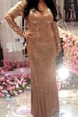 Absolutely beautiful dress and very comfortable to wear. Received so many compliments. Initially was worried that it would be too low cut in the front like it showed on the model wearing it, but after seeing the pictures from the reviews I decided to buy it. I'm so glad that I did. It was at such a good price too. - Dilbar B.