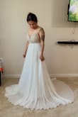 The top part of the dress is heavy, but it's gorgeous! One of the pads was not stitched well, but it was usable. The strap is a little long, and the waist part is tight. I need to lose a few inches, lol - Jo-anne M.
