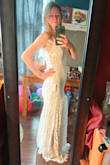 This review and pictures are for the size Small (I originally got XS but it was too tight in the bust; I couldn't breathe) I love this dress, though! It's nice and light for an August wedding. I plan to add some upper arm cuffs - Amanda M.