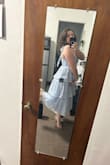 I love this dress. I've been looking for a dress with layers that I could wear for graduation and this is perfect! It will need to be ironed or steamed but other than that it was ready to wear right out of the bag. - Erin B.