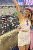 Loved wearing this to Taylor Swift! Fits a little big, but a size down would maybe be too tight. It's definitely cropped for us taller girls, but the skirt is high-waisted also. - Alexa R.