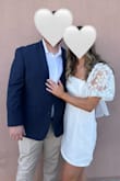 I wore this dress to our civil ceremony and it was perfect! It wasn't see-through, but I did wear spanx underneath because it is very short. If you have a small chest, there will be a lot of space/extra fabric in the top even after tightening the bow. The top fabric is almost like a shiny satin while the bottom has an overlay of tulle. Overall, I think it is a great quality dress for the price! - Shannon K.