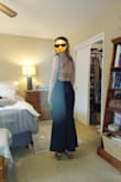 This dress was for a military formal function at the United States Naval Academy. My daughter loved the back. She's curvy/ athletic build. She ordered a medium. I felt the the dress was a little short, but she said it was easier to walk in. All in all, a quality dress! - Dannielle M.