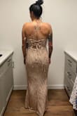 Sizing on the website had me about 60% a med and 40% a small. I went with medium and it fits PERFECTLY! The material has some stretch, but if your waist or butt is much bigger than mine you might want to size up. I am 5'7.5" and this dress hits the ground which is often hard to find. - Verona T.