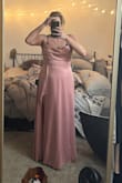 Unfortunately, this dress fell very flat for me. I got it to have as a backup dress for a wedding I'm attending. Honestly, I would be embarrassed to wear this in public! The color is darker than in the picture. Almost a salmon pink. The fabric itself is quality and nice, but this dress is so unflattering. The slit makes no sense. It looks like someone messed up when sewing it. The top part is all dumpy looking and doesn't lay flat like shown either. - Jenna E.