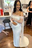 My husband and I decided to have a small, intimate backyard wedding and I ordered this! I was 6 months pregnant and this dress fit perfectly. If I wasn't pregnant I would have ordered a small but ordered a medium due to my belly. Overall loved the fit and look of this dress! I got so many compliments! - Erin S.