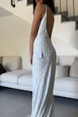 This dress is absolutely wonderful; it fits the body perfectly, and the fabric is of incredible quality. The details look like tailor-made atelier. - Paloma J.