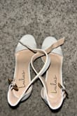 I ordered an 8.5, which is my usual size, and they fit great. They are very comfortable and are easy to walk in. The gold buckle is a very nice touch. Overall, I love these shoes. It says off white for the color, but I promise they look like a normal white. The only thing I was struggling with was the holes on the ankle strap. There wasn't a hole that made them buckle tight enough on me, but I poked an extra hole and they looked fine. - Kaitlyn T.