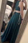 The dress fits perfectly, which is a huge plus. The quality is excellent, and it seems well-made. Also, the shipping was impressively fast. Overall, a great experience with this dress! - Rita K.