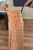 I like this, and the color is amazing! The issue is that I have wider hips and a smaller waist, and this skirt isn't flattering. the top part is way too big for my waist but there is no give in the hips to get a smaller size. Won't return, but I'll probably have to belt it when I wear it. - Sarah M.