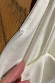 Pretty disappointed I just got my dress out of the bag, I am supposed to be wearing it Thursday for my wedding. Where the metal wiring is along the cleavage the wire is coming out. This is going to be uncomfortable poking me and will hopefully be hid in photos. - Ronee E.