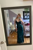 The dress is exactly what I wanted, it fits perfectly, and looks phenomenal! I am so excited! I am wearing it to my boyfriends prom so this was a perfect not very expensive option! I would 100% order again. Just be aware the sequins to scratch my underarms because they rub against and I have had a couple red marks but it's not too bad! - Nathalie G.