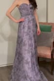 This is a beautiful dress. I usually wear a 0-2, so I ordered an XS, but I thought the way the waist hit me, the fabric of the skirt puffed out at the hip. A size up fixed this problem, but it is so long, and the cups don't lay against my body. I can't decide whether to keep it and get alterations  to fit since it's pretty  or return it. If  you have the right body type for it to fit well, it's gorgeous! - Kelanie M.