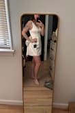 It was such a saga to finally find a perfect second-look dress, and this is it! It's a perfect fit and perfectly covers the armpit chub that can be relentless! I love the removable bow. Such a cute and fun dress to dance in! - Emily M.