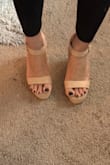 Pleasantly surprised by the comfort level - since they're wedges you can wear them much longer than heels. - Christel H.