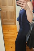 I bought this color, and the pink and the navy blue are much better looking. But still, the material is cheap and stretchy. You will need a tummy control shorts to keep everything sucked in as this clings to your belly and shows all underwear lines. I really wanted to like this, and if it had been a better quality material, I would definitely keep it. - Ann H.