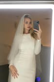 Don't buy it, it will make you look like you are drowning in a tulle tent. I was hoping for something simple and elegant, but it is really thick and has strange layering, which is very distracting and hides your bodyshape. - Josefin S.