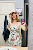 I held off from ordering from Lulus for far too long. I'm so glad I finally did because this is the perfect dress for my Italian vacation. I will agree that the photo shows a crisp white dress, and it does have more of a cream background color. However, for me, it works even better. I will also agree that it would be nice for the straps to be adjustable, but they have stayed on my shoulders. A regular bra does not work as it shows in the front where the straps are connected to the dress. It has enough support for me to wear Cakes nipple covers and go braless. However, having adjustable straps would provide a little more lift to the girls. I am so happy with this dress. Thank you Lulus for providing this quality staple for my upcoming vacation. - Alicia J.