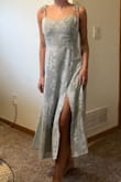 I got this dress for a beach wedding in December. I love that it works in any season and the length is perfect to be safe from any wind mishaps. The straps are ties so they are adjustable. The chest area as a tad bit too much room for me but still lays nicely. The dress stretches in the back and zips on the side so it's easy to get on and should work for all body types. Slit is not so high so I can still wear shorts underneath. The fabric quality is great with a bit of texture and sparkle, the dress is lined so it's not see-through. LOVE! - Aliah D.