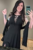 The dress is beautiful and flattering. I love the material and I love the lace by the arm opening since it prevents awkward armpit situations. The slit is perfect, not too high and the lace in the front is sexy without being too revealing. It does run large as others have said. If you're small-chested like me, you'll need a good padded bra (or some booby sticky things since its open in the back; I just pinned my bra into it) and you will have to get it hemmed unless you're very tall or wear 6 inch heels. - Chyna-Rae D.