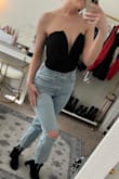I saw Kristin Cavallari wear a similar body suit and I am so happy I finally found one just like it! It runs small but the wire that outlines the deep V cut holds everything in tight. Perfect with high waisted jeans for a night out. If you are not flat chested. I recommend sizing up. - Ashley H.