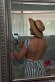 I felt like a 50s Barbie in this romper! It is perfect to throw in a suitcase and wear walking around for a day on vacation or a summer brunch. It doesn't need ironing, is very comfortable and stretchy, doesn't need to wear a bra/fully opaque, and looks like you're dressed. Perf with a boater hat and sandals. Took off a star bc the elastic waistband was saggy in the back. I had to keep folding it over, and the tie was a bit complicated. I had to use a lot of double-stick tape to keep things hidden -- but if you have a lot on top, I think this would not need tape :) - Kaitlyn W.
