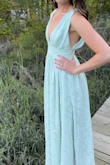 This dress was super comfortable! The slit was a conservative height. Dress was longer than most. The top was well made-no bra needed and worked for the flatttt chested, but also room for more up top! - Amy S.