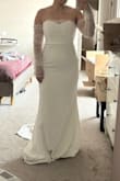 It's truly a beautiful dress but I don't think it'll do for my wedding. I wish I loved it more as I waited to get a M for a while and it fits like a glove. - Kathy H.