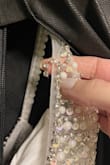 The dress is very beautiful, the color is amazing. I do not recommend it to anyone who has large breasts like me. The dress must be handled with caution. I received the dress with several tears, but its color is very beautiful. I will return it and buy something more comfortable for myself. - Rola H.