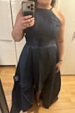 Was very disappointed that the skirt was off center from the torso - easy to tell with the darts. Also a bit long, even while wearing platforms with 4in heels. Returning - Melissa G.