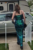 Bought this dress for my daughter's senior prom. The photos don't show just how beautiful the colors are on this dress! The sequins go from blue to green to purple depending on the light and angle you're looking at the dress from. Only had to hem the bottom up an inch! She was covered everywhere and able to walk, dance, or just plainly move around without worrying that she had to hold her dress up or over! Both she and I could not have been more pleased, between the fast shipping and the low cost of a gorgeous dress. We have told everyone that Lulu's is fantastic! - Carrie W.