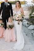 This ended up being the dress I had always wanted. Only needed a little hemming in the front because I am short and went barefoot. The fabric was high quality and the beading was stunning. The sheer top was elegant and not too revealing. - Kat Y.