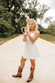 Beautiful dress. Perfect for graduation photos! - Gabriella L.