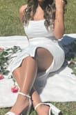 The dress came in perfect condition with no stains and looks just as shown on the website. I would consider wearing light undergarments since the dress is white. Would recommend for anyone looking for a dress worth your money. - Daniela R.