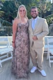 This dress will get you so many compliments. It's forgiving in the hips and waist. I am small busted and it was tight. I would size up. The dress is very long too. - Lindsey M.