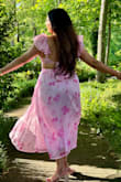 The dress is beautiful! I wore it to a friend's garden wedding and literally got so many compliments on it! I am busty so I had a sticky bra on and it took me some time to be comfortable with the amount of cleavage but it's honestly such a pretty dress. Shoes are also from Lulus! - Roopal K.
