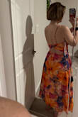 Ok, these colors are stunning. The back looks like a butterfly. It fits me perfectly. I was worried that it wouldn't based on other reviews saying it was tight up top. I have a small rib cage - 32 band for my bra. So if you're similar it will fit perfectly. I will wear my sticky bra for the wedding. The only downside is how long "midis" are on me. I'm very short-legged and long-torsoed. I chose a midi instead of a full-length dress so I wouldn't have to hem! It's also very forgiving in the midsection/hips. - Content H.