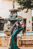 I was looking for a somewhat-formal long-sleeved dress for our engagement pictures. When I found this green one, I knew I had to have it! I ordered an XS, and it was big but not noticeable. I thought it was especially large in the shoulder area. Nothing a little bit of tailoring couldn't fix if I plan to wear it again! - Morgan A.
