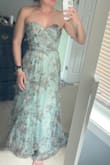Followed the suggestions that said to size up but probably would have been better off sticking with my usual size. Although, the corset-style back allows for flexibility. Great quality and absolutely loved the pattern of this dress, just didn't love how the strapless looked on me. 5'5, 130lbs, 34B - bought a medium - Samantha B.