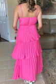 Comfortable. It was dressy nice material. Many compliments. No bra needed. Bunched up in the back a little - Allison C.