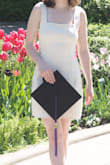This is probably my favorite dress in my closet as I love the material; easy to get the wrinkles out with just a blow dryer. I do enjoy how it is true to size and not form-fitting, but I would have preferred shorter straps to not have such a big gap on the shoulders so the straps aren't likely to fall down. - Kelly A.
