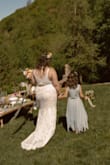 I ordered 2 dresses from Amazon, 1 from eBay, and 4 from Lulus, and when I tried this one on, my partner and I were both instantly like "This is the one!" It was so comfortable ALL DAY for my wedding (I wore it for about 8 hours). I wore it with a simple shapewear suit underneath (from Amazon) and didn't need an additional bra. My boobs may have looked more lifted with a bra but I didn't want to deal with finding one with the right shape and straps to match the dress and be concealed. I got so many compliments both during the wedding/reception + afterward when people look at the photos they love the dress and can't believe I got it online at this price point.
I'm SO grateful I found Lulu's!!! By the way 2 of the other dresses I ordered here I also loved, this company makes great products! And, the shipping was incredibly fast, the dresses came with a free hanging dress bag that came in so useful (and I wouldn't have thought of!) and pretty wrapping paper. I was shook when I opened the box. Bust: 47" - Makenzie C.
