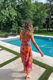 Absolutely love this dress, it fits perfect and is comfortable and flattering.  I ordered an XS for reference. - Cammie T.