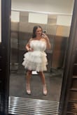 It's honestly comfortable other than the tulle that's in your armpits. It was really helpful having the grip lining on the top of the dress. Try not to sit for too long in it though or else the tulle will fold and wrinkle. - Jenna M.
