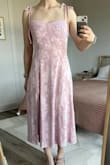 The fit is as expected, ordered a size Small. The material will be great for hotter months. A little sheer if wearing darker colored undergarments, but not see through. Ruching in the back helps with fitting multiple sizes. - Tiffany I.