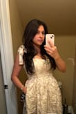 Was loving this dress online for weeks but kept putting off buying it because I wasn't sure if the large would fit my bust and there wasn't an XL option available. I'm at 34 G and it's so difficult to find anything to fit me right now. The dress sold out so I pretty much gave up on the idea of having it but signed up for notifications in case a large popped up. As luck would have it ONE large was available a couple of days later. I ordered it and was sooooo happy I did! It's truly a special dress. Even fit these huge boobs without having to get it let out. One of the buttons fell off but I sewed it back easily and quickly. - Iliana R.