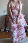 This dress is quite flattering and I think it looks great on me. That said - it runs small. I ordered a Large and it fits really well (I am not a large - I'm a medium) so go one size up. It also has no stretch due to the fabric, although I did have some space in the torso since I have a small bust. For the length, it ends mid calf on the model since obviously they are super tall but on me it ended right around the ankle. Also, as with all Lulus dresses the zipper in the back is EXTREMELY poor quality and gets stuck at the seam so I will have to probably get it replaced eventually or fix it myself. - Casey N.