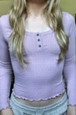 Overall, very cute top! It does run a little tight, so I would size up but it's not too tight where I needed to return it. - Emma P.